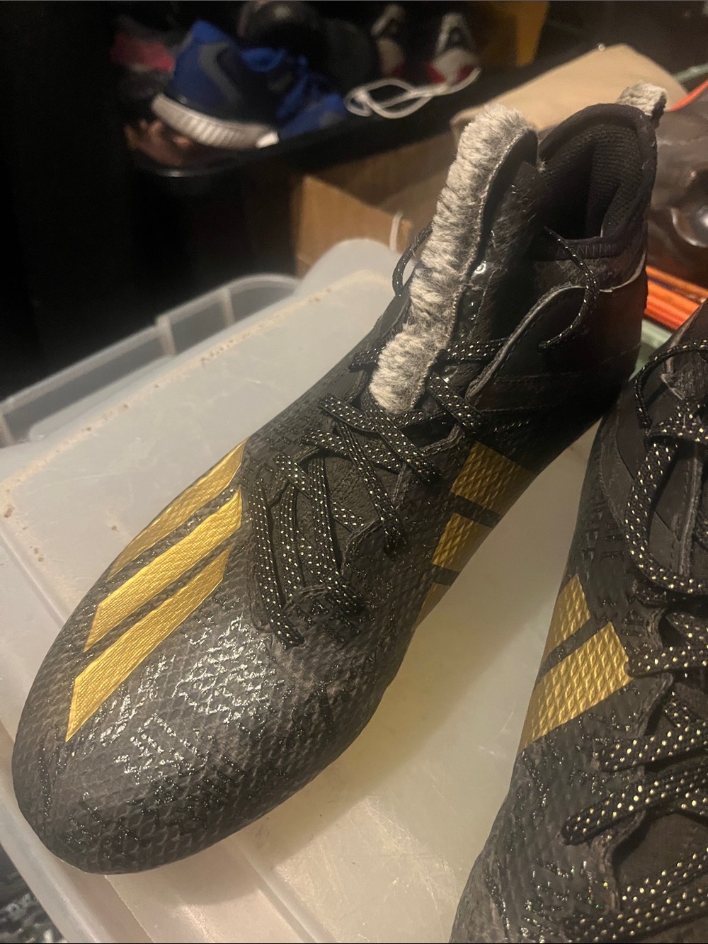 adidas Men's Black and Gold High-Top Athletic Cleats